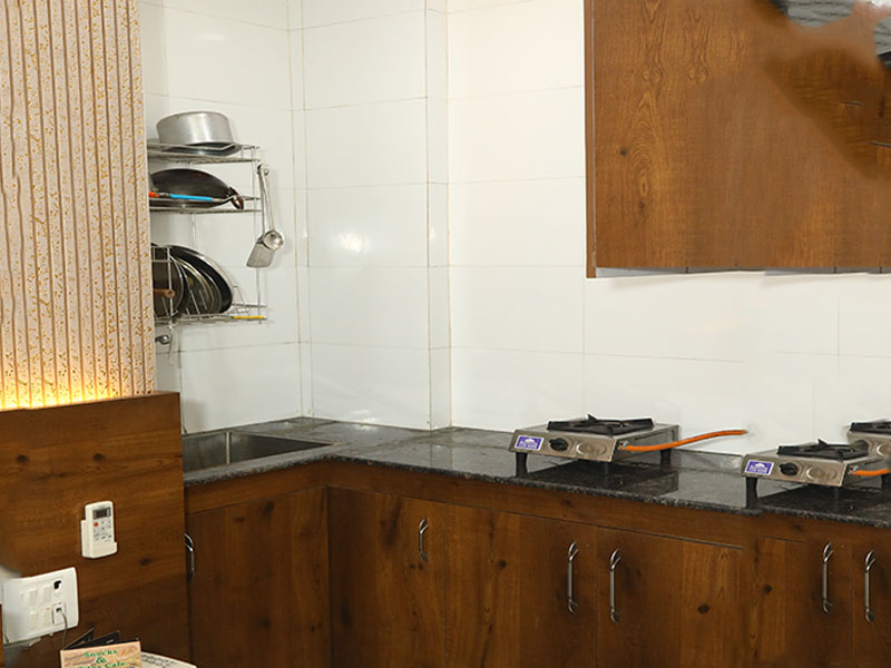 Fully equipped private kitchenette in hotel room for self cooking